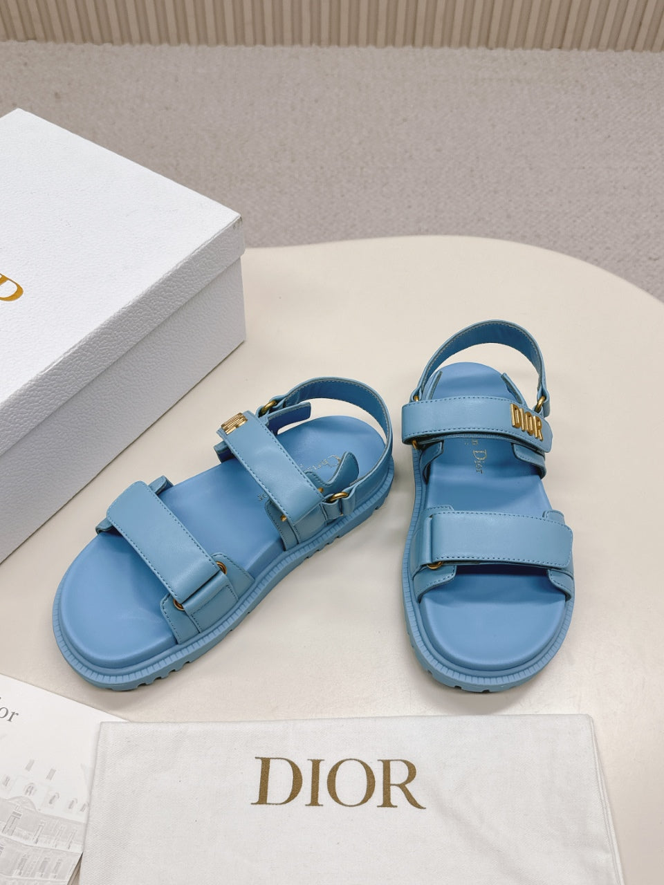 DIOR BACK-STRAP SANDALS 25S IN OCEAN BLUE CALFSKIN WITH GOLD HARDWARE