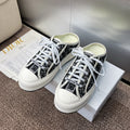 DIOR 25S WALK'N' SNEAKER IN BLACK WHITE OBLIQUE EMBROIDERED COTTON